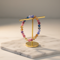 Peach & Teal Beaded Bracelet – Marble Slab Gold Stand